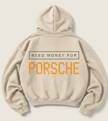 Cream Need Money for Porsche hoodie with a dark-green rectangular text frame and large orange dot-matrix Porsche lettering on the back
