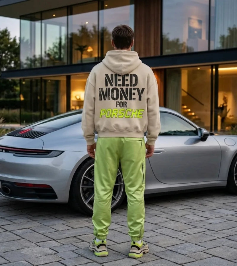 Cream Need Money for Porsche hoodie with distressed charcoal stencil lettering and neon-lime angular Porsche graphic on the back