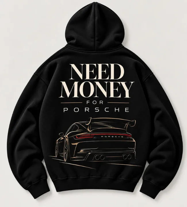 Model wearing black Porsche graphic hoodie with large cream lettering, gold sports car outline and racing wing back print