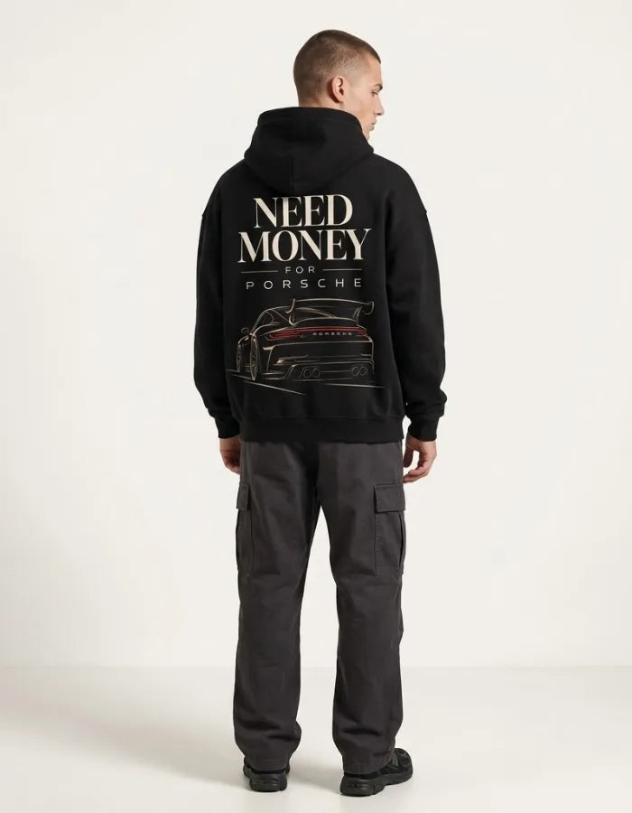 Black Need Money for Porsche hoodie with cream typography and gold-tone rear wing sports car illustration with red taillights